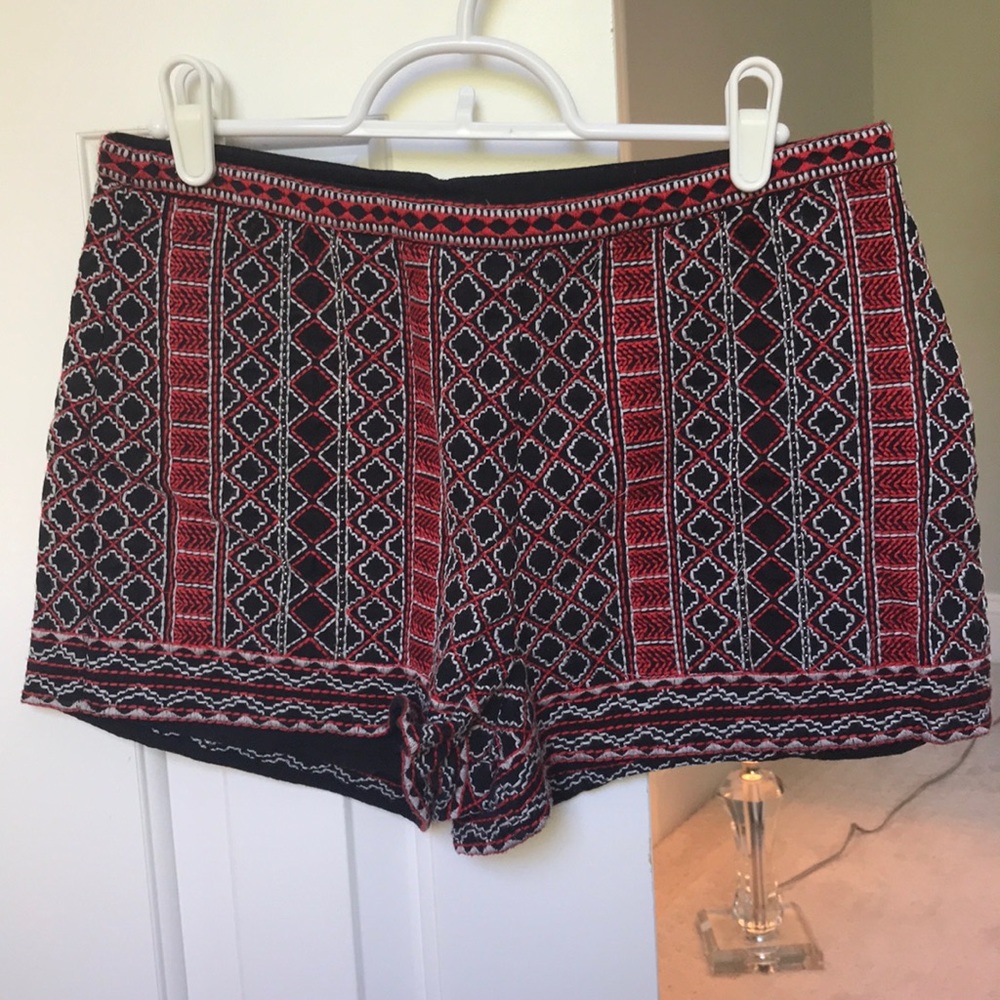 Red and black pattern shorts.